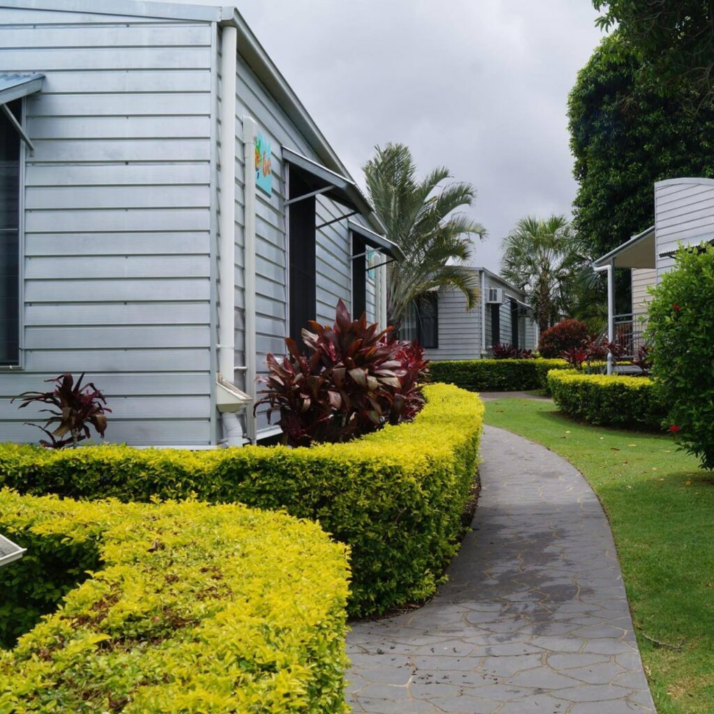 How to Travel Safely and Support Local Businesses - side view of Sleepy Lagoon Motel Cabins